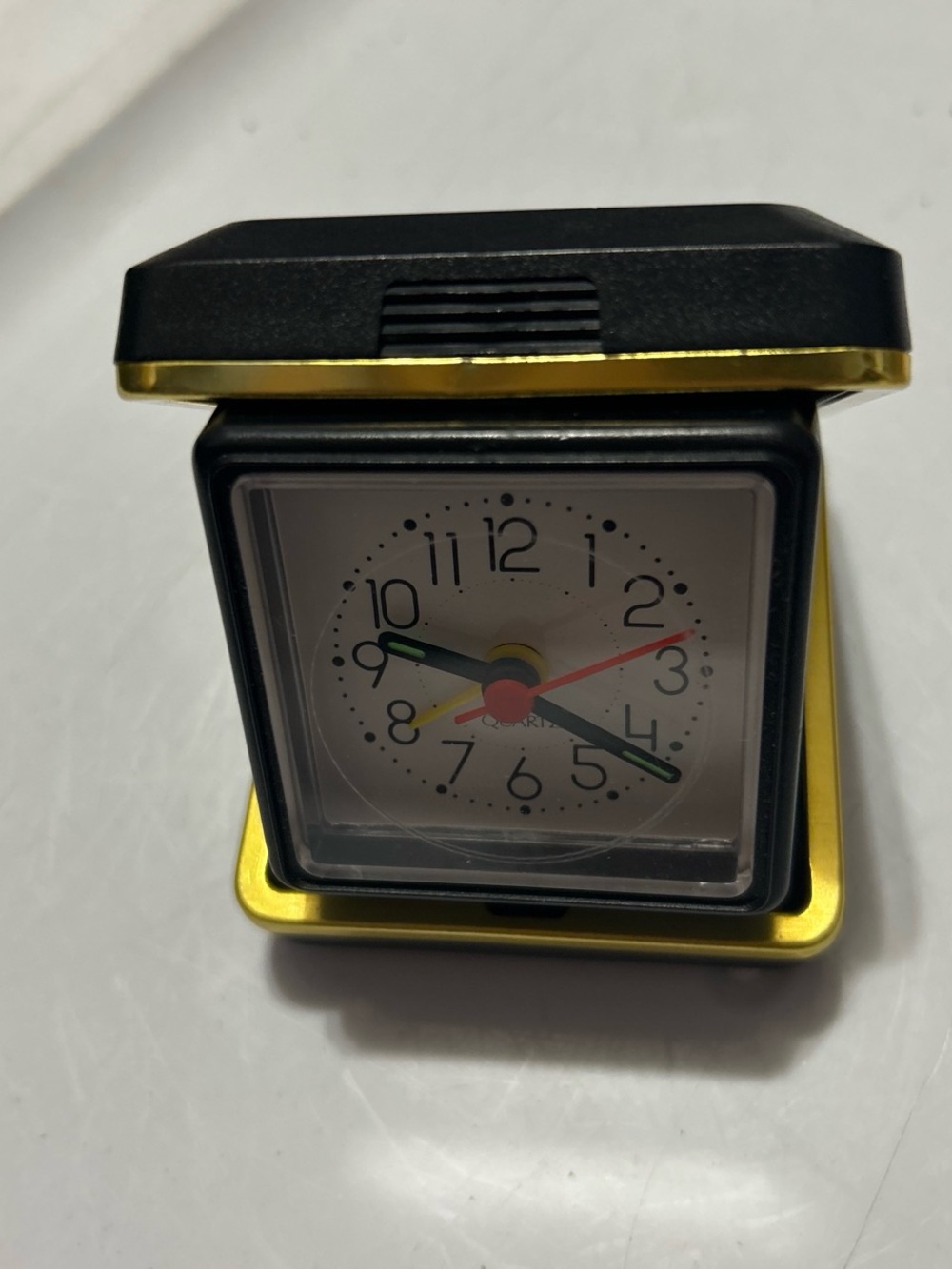 Compact Travel Alarm Clock in Black and Gold
